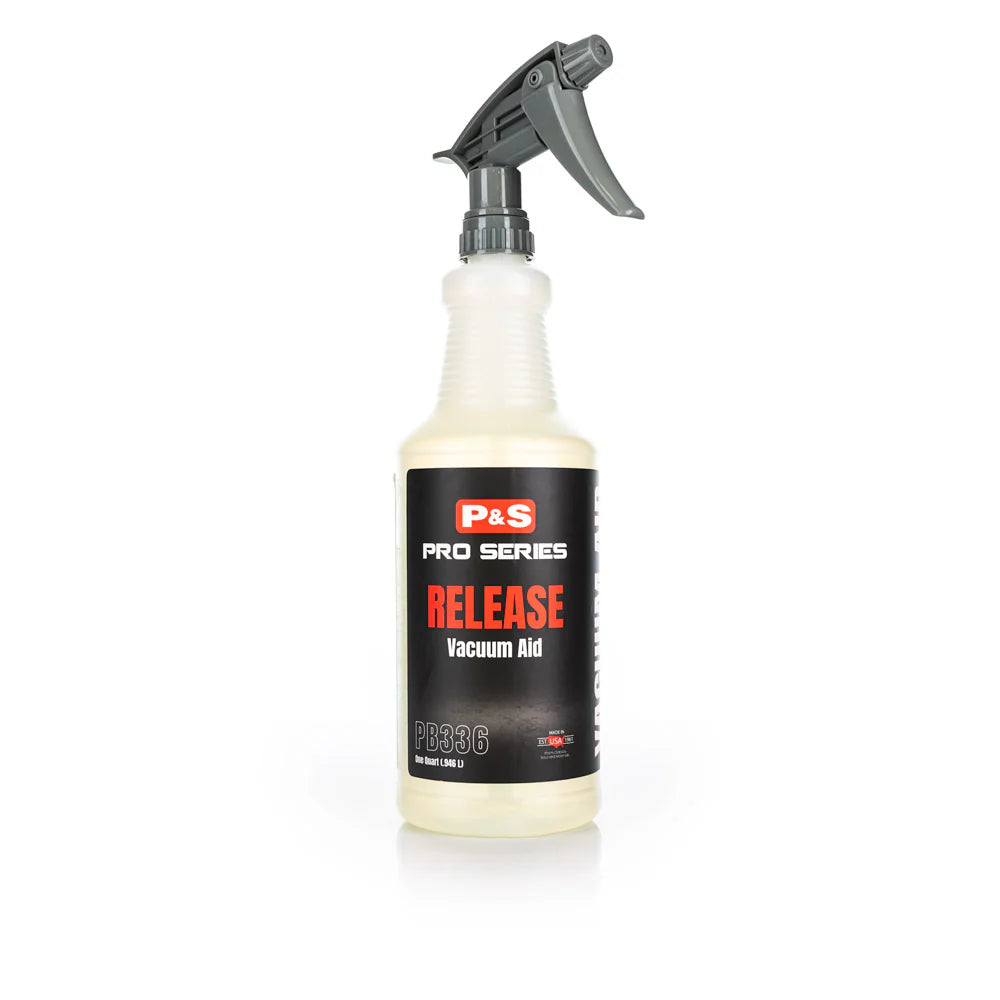 32 oz bottle of P&S RELEASE Vacuum Aid that allows for quicker and more effective suction during vacuuming.