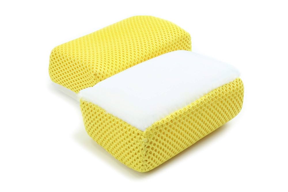 2-pack AutoFiber Scrub Ninja Scrubbing Block for targeted cleaning of interior surfaces like leather, vinyl, and plastic.