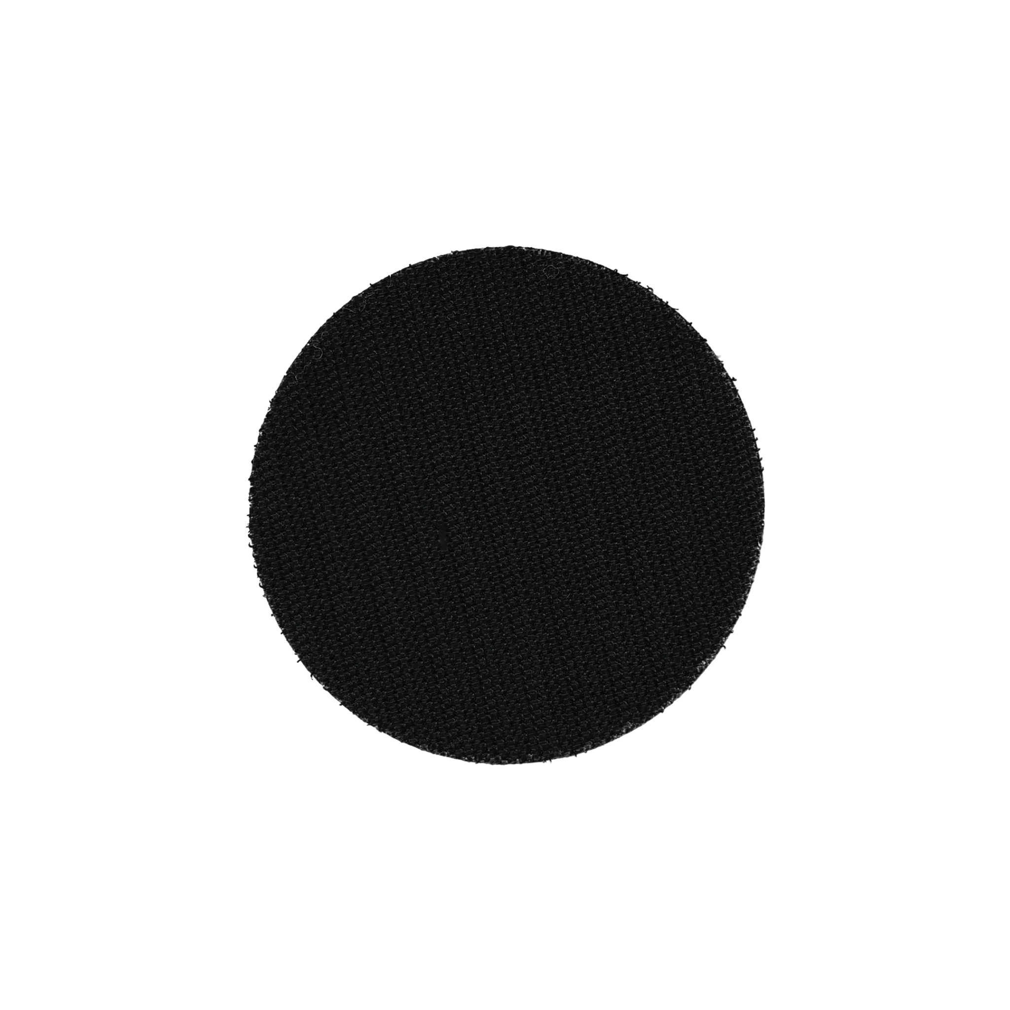 Black circular patch on a white background