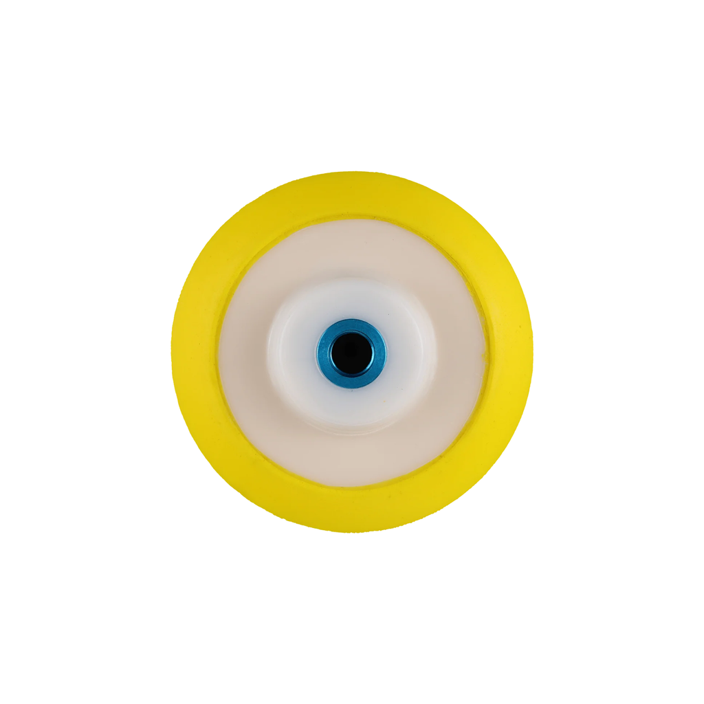 Circular object with yellow rim and blue center on a white background