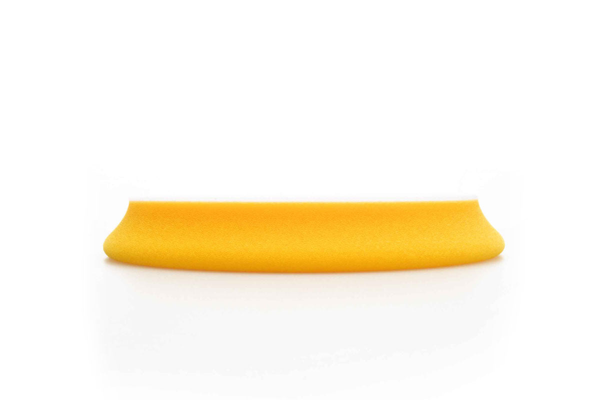 Side view of RUPES D-A FINE Finishing Foam Pad to show the reduced pad height and new vibrant shade of yellow.
