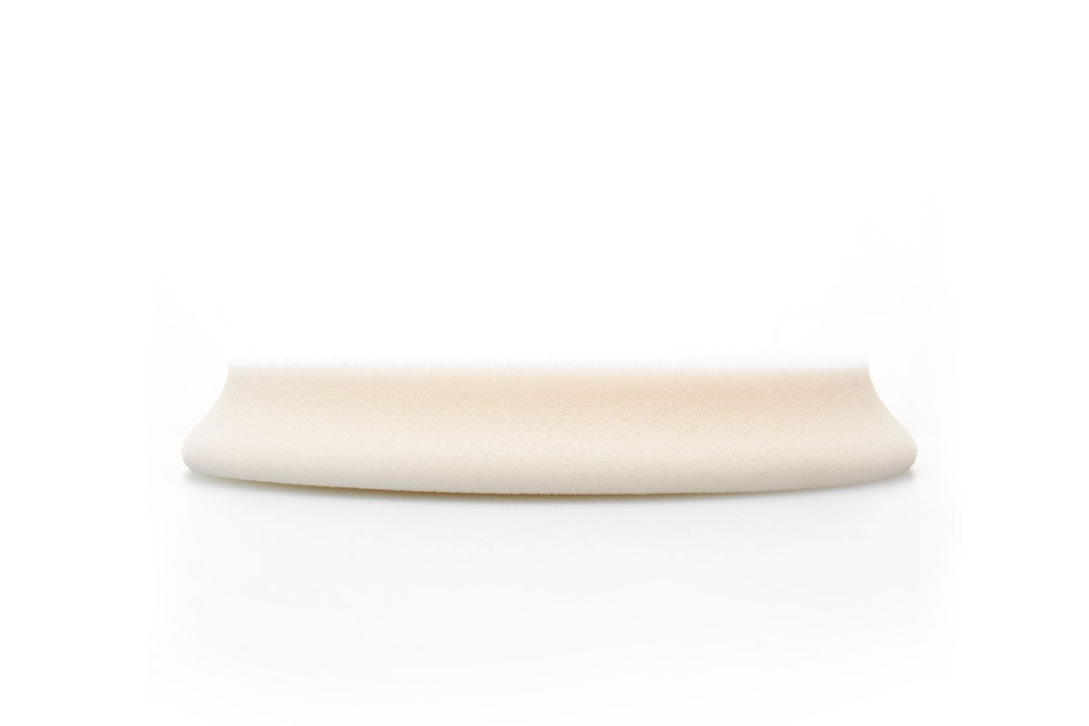 Side view of RUPES D-A ULTRA-FINE Polishing Foam Pad showing the new contoured edge and redesigned pad height.