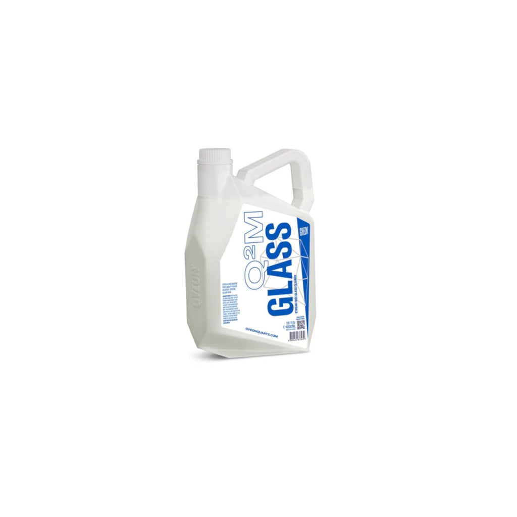 Gyeon white container labeled 'QAM Glass' on a white background
