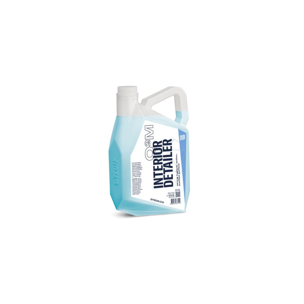 Container of interior detailing product on a white background