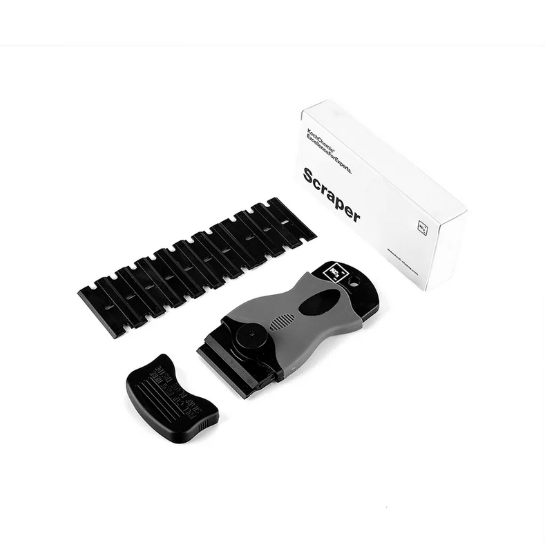 Koch-Chemie Scraper tool for removing stubborn residues from plastic and smooth vehicle surfaces.