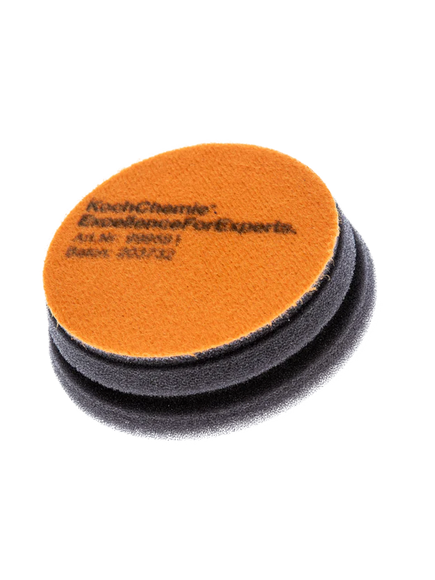 3-inch Koch-Chemie One Cut Pad, medium abrasive foam for moderate scratch removal with excellent stability and flexibility.