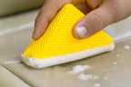 Autofiber Scrub Ninja Wedge Scrubber with firm edges for detailed cleaning in tight spots and hard-to-reach areas.