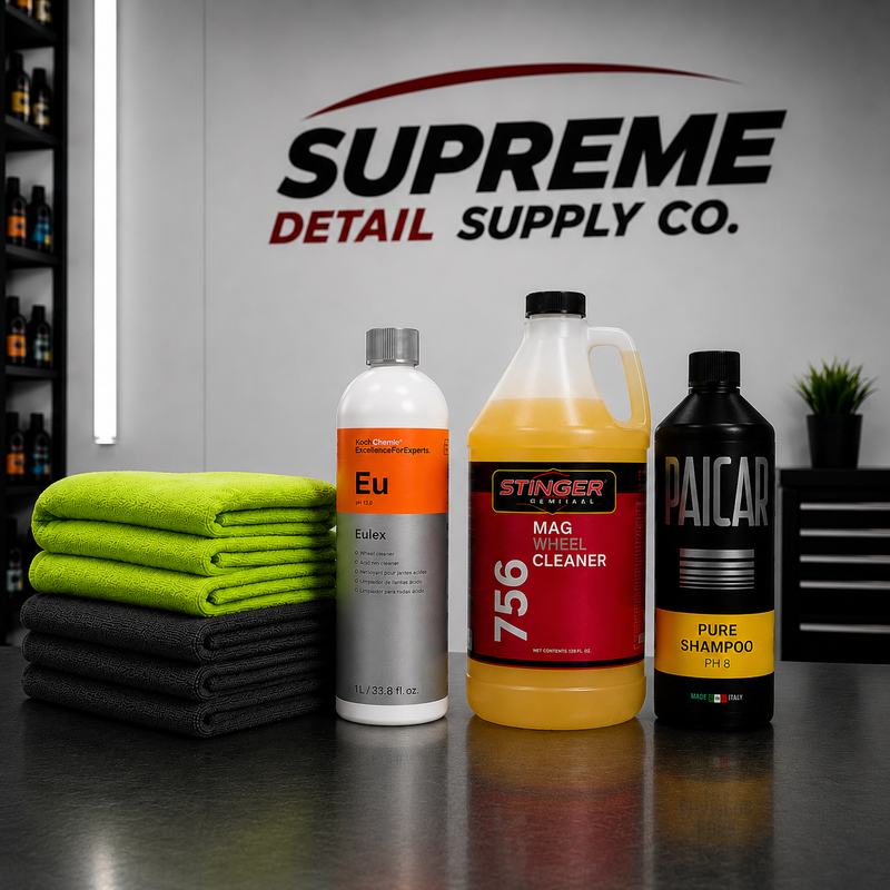 Automotive care products including towels and bottles with 'Supreme Detail Supply Co.' branding in the background.