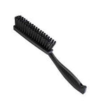 Koch-Chemie Upholstery Brush with firm bristles and ergonomic handle for cleaning fabric seats and carpets.