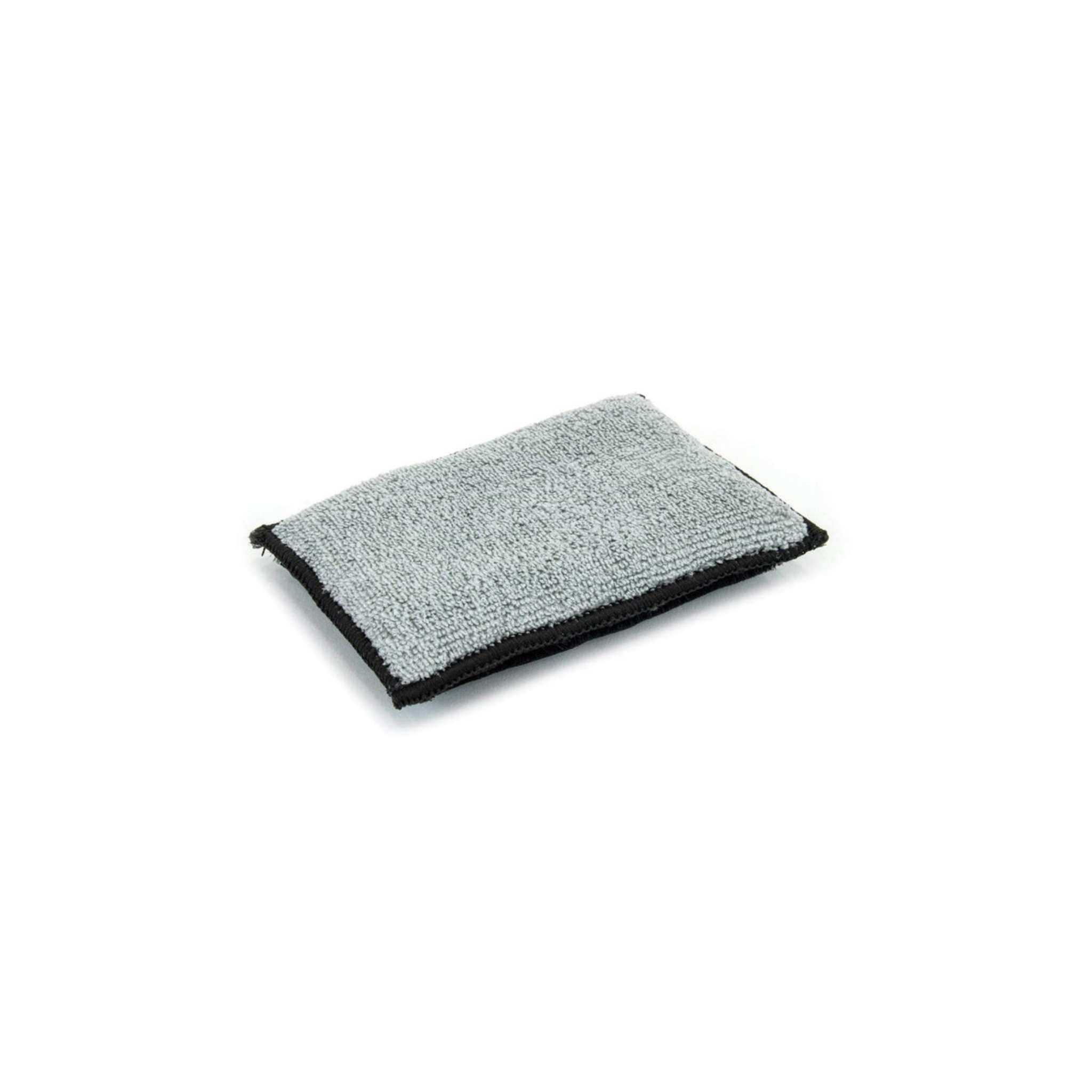 Autofiber Scrub Ninja Interior Scrubbing Sponge shown in black and gray with dual-texture design for deep cleaning.