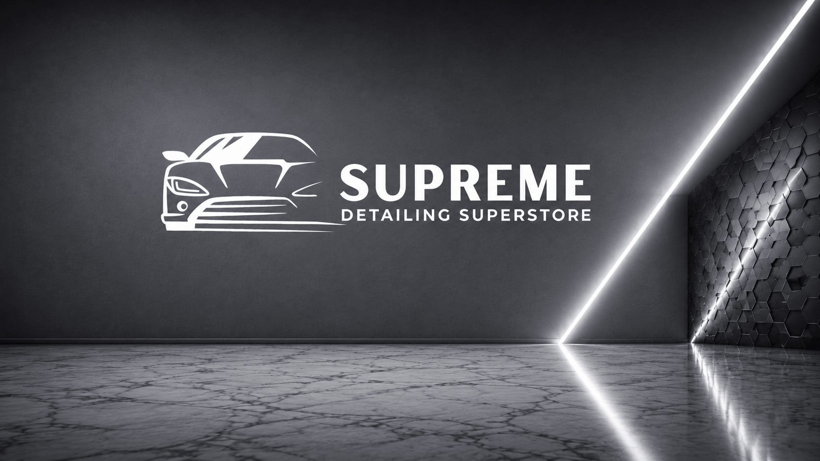 Supreme Detailing Superstore logo on a dark wall with a car illustration.